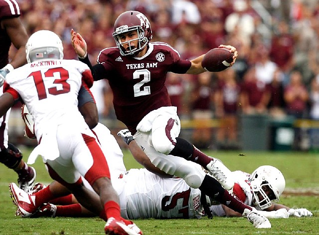 Johnny Manziel accounted for 557 yards of total offense in a 58-10 win over Arkansas on Sept. 29, 2012 at Kyle Field in College Station, Texas. 