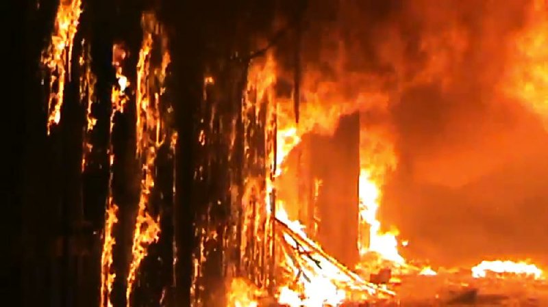 In this video image, fire consumes an ancient market in Aleppo, Syria, on Saturday after pitched battles between government troops and rebel fighters. 