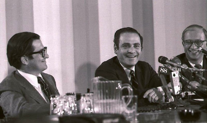 Arthur Ochs Sulzberger (center), then-New York Times president and publisher, attends a July 1, 1971, news conference after the Supreme Court ruled that the Times could continue publishing the Pentagon Papers, a series of classified reports on the Vietnam War. 