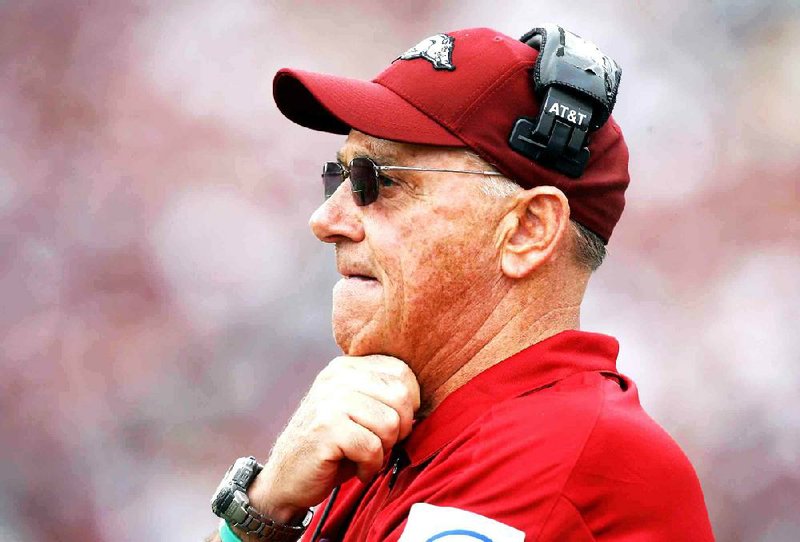 Arkansas head coach John L. Smith watches from the sideline during the fourth quarter against Texas A&M on Saturday, Sept. 29, 2012, at Kyle Field in College Station, Texas.