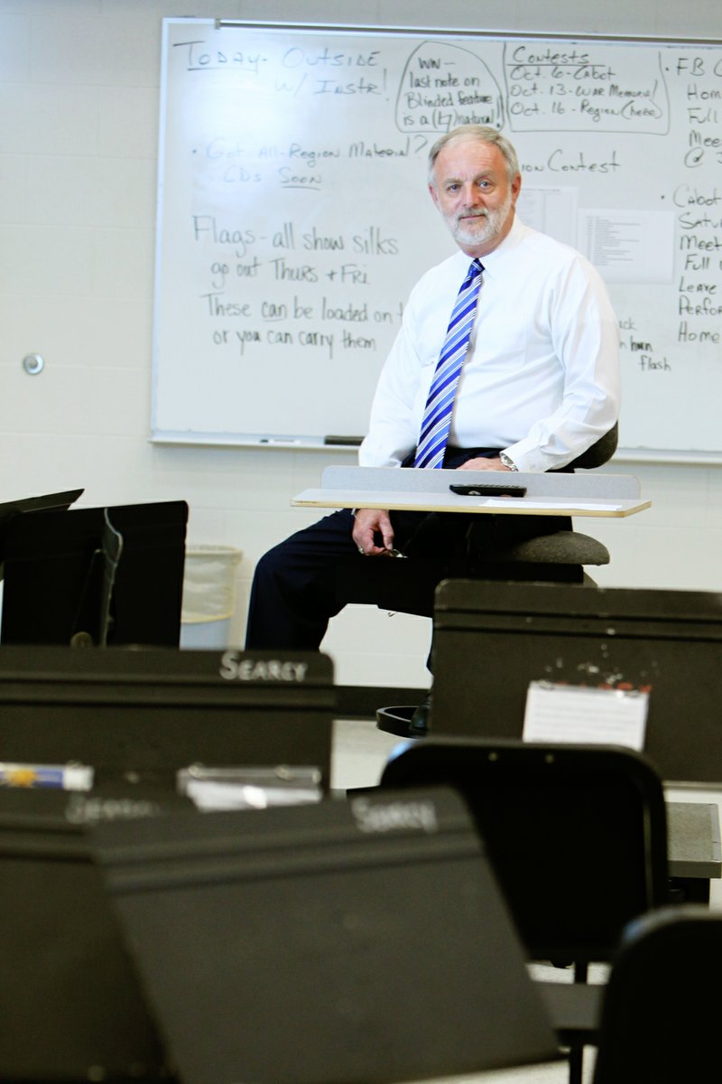 Claude Smith, principal at Searcy High School, sits in the band room at the school. Before moving into administration, Smith served as the school’s band director.