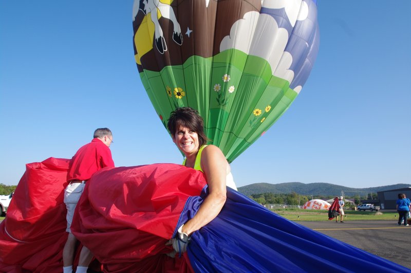  Lynette Howell helps to get a balloon ready for the annual Legends Balloon Rally in Hot Springs.