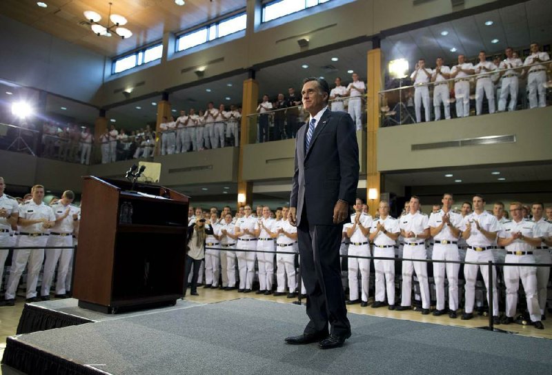 Mitt Romney arrives Monday to make a foreign-policy speech at Virginia Military Institute in Lexington, Va. Romney criticized President Barack Obama’s policies in the Middle East, saying, among other things, that U.S. troops were pulled out of Afghanistan too soon. 