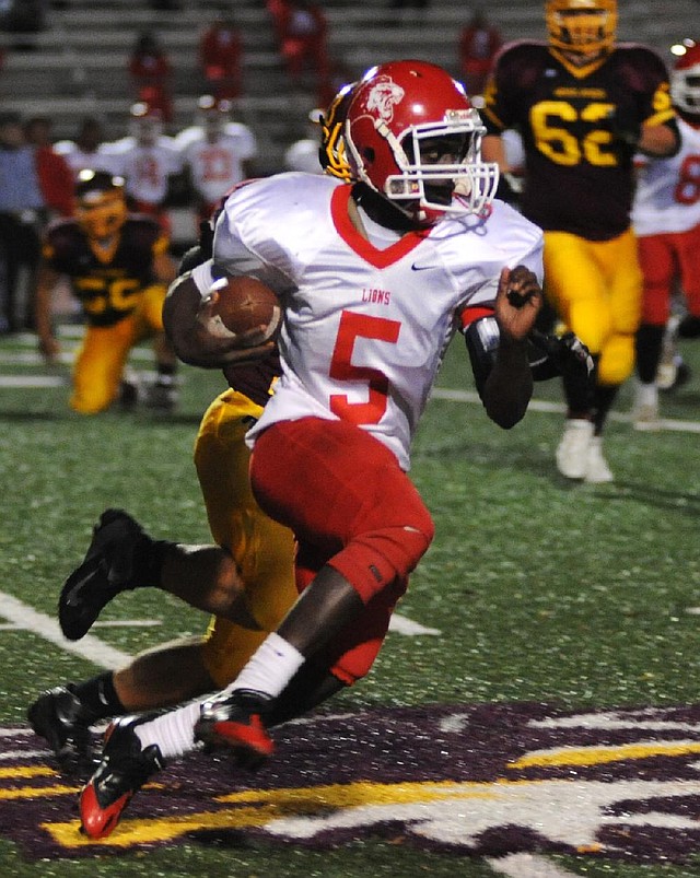 Little Rock McClellan’s Akee Johnson (5) had 304 yards and accounted for five touchdowns in a 40-32 victory over Helena-West Helena Central on Friday night. 