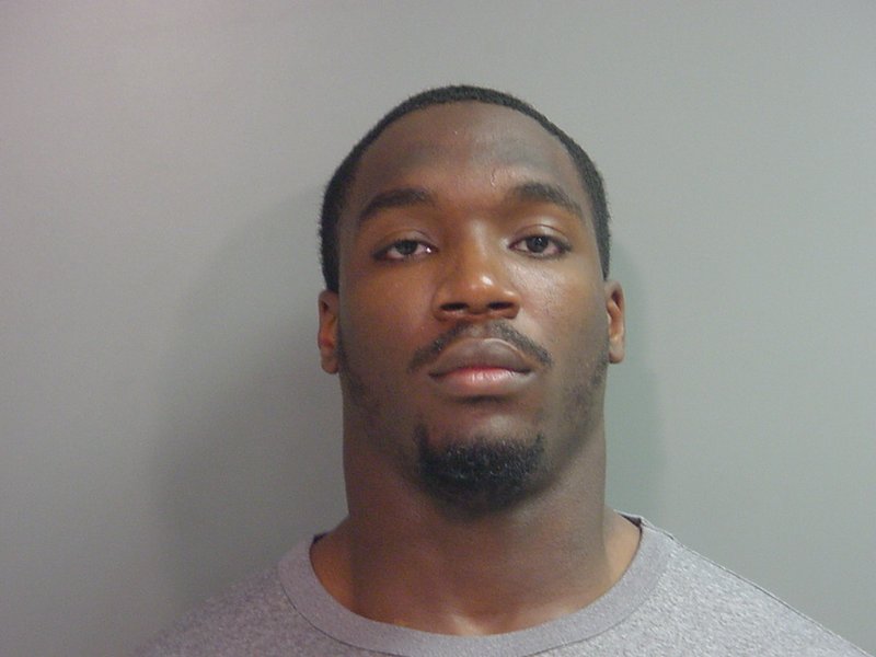 Christopher Smith, an Arkansas defensive end, was arrested on Wednesday. 