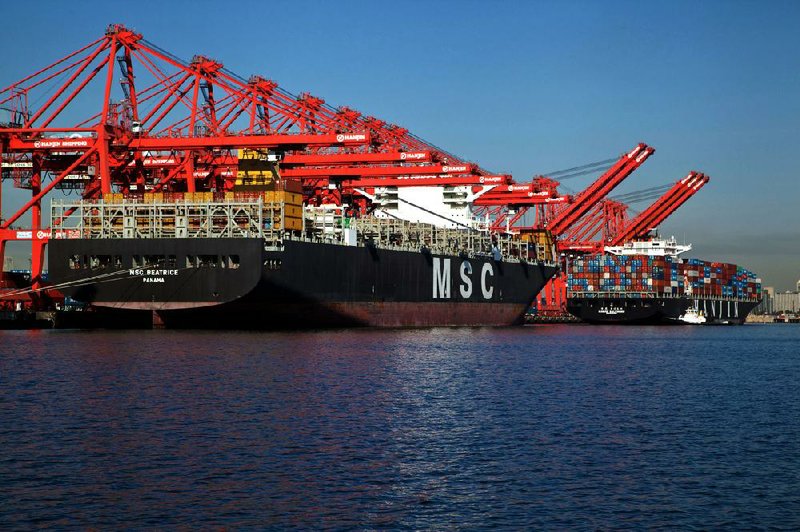 The MSC Beatrice, the largest container ship to make port in North America, is docked in the Port of Long Beach, Calif., earlier this month. The U.S. trade deficit widened in August to $44.2 billion, the Commerce Department said Thursday. 