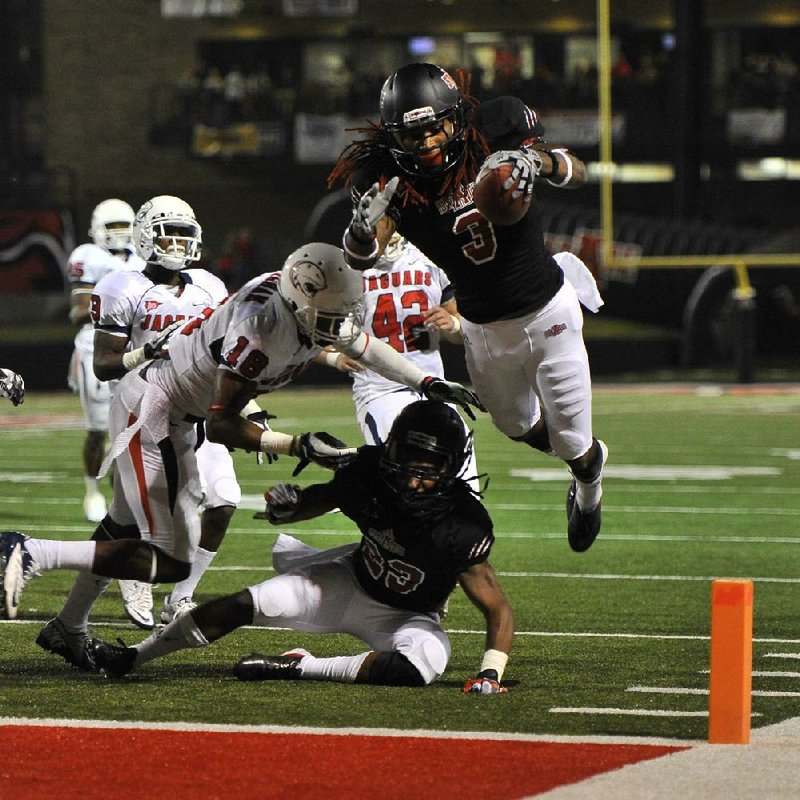 Arkansas State wide receiver Josh Jarboe (3) dives into the end zone, scoring on a 15-yard reception in the third quarter of Saturday’s game against South Alabama at Liberty Bank Stadium in Jonesboro. Arkansas State won 36-29.The Red Wolves (4-3, 2-1 Sun Belt) are looking forward to watching tonight’s game between Louisiana-Lafayette and North Texas and getting an extra day off from practice. 