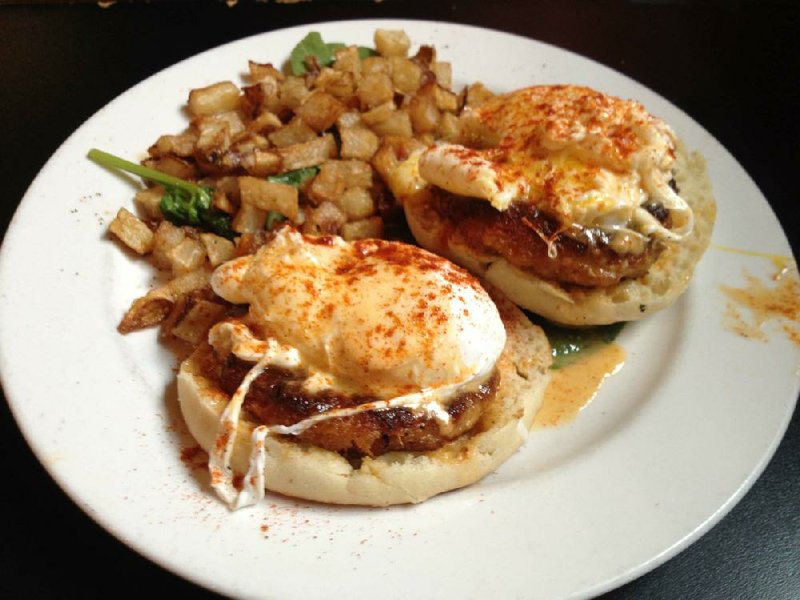 The Octopus’ Garden — crab cakes on an English muffin, topped with a poached egg and chipotle hollandaise sauce — is an option at Rumba Revolution’s Beatles Brunch. 