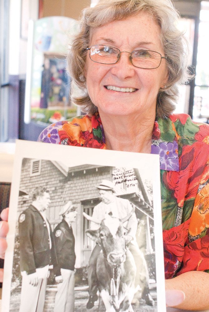 Marietta Thompson of Tuckerman has ties with cast members from The Andy Griffith Show. She has collected memorabilia along the way, including a photo signed by Hal Smith, who played Otis on the show.