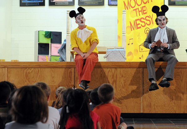 Zac Engle, left, and Alex Elliott, both with the Tulsa Opera, play Mooch and Father during Marcus DeLoach’s “Mooch the Messy” on Monday at Westwood Elementary School in Springdale. The Opera is taking the performance, about a messy rat’s visit from his father, on a tour through select schools in Oklahoma, Missouri and Arkansas.