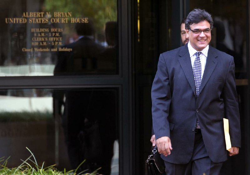 Former CIA officer John Kiriakou leaves the U.S. District Courthouse on Tuesday in Alexandria, Va., after pleading guilty, in a plea deal, to leaking the names of covert operatives to journalists. 