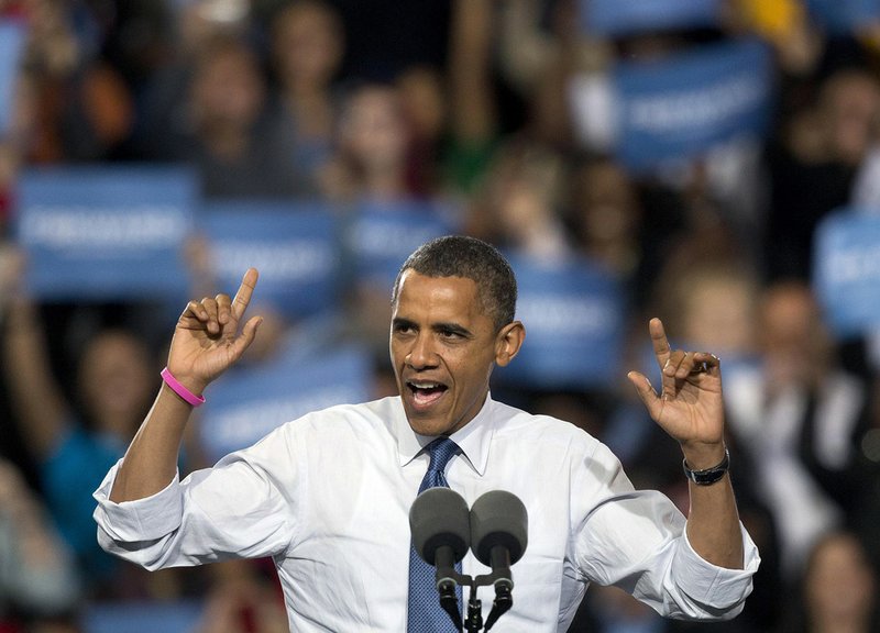 President Barack Obama speaks during a campaign rally, Wednesday, Oct. 24, 2012, in Las Vegas. The president is on a two-day tour of key battleground states that included stops in Iowa and Colorado on Wednesday and was scheduled to head to Florida, Virginia and Ohio on Thursday. 