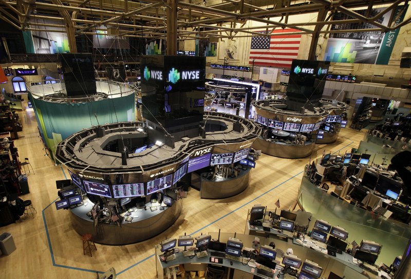 The floor of the New York Stock Exchange is empty of traders, Monday, Oct. 29, 2012, in New York. All major U.S. stock and options exchanges will remain closed Monday and Tuesday with Hurricane Sandy nearing landfall on the East Coast. 