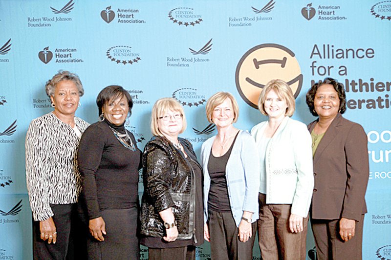 Susan Parker of Eagle Mountain Magnet School in Batesville, third from the left, accepted a Silver National Recognition Award for the school at the national Healthy Schools Program Forum in Little Rock on Oct. 21. The award was given by the Alliance for a Healthier Generation. It recognized the school’s efforts to improve its students’ health through a Healthy Schools Program, which Parker oversees for the school district. Pictured from the left are representatives of other award-winning schools: Cecelia Baker, Lee School District; Sylvia Halliburton, Lee School District; Parker; Teresa Mallett, Marion School District; Becky Northcutt, Marion School District; and Shirley Crawford, Lee School District.