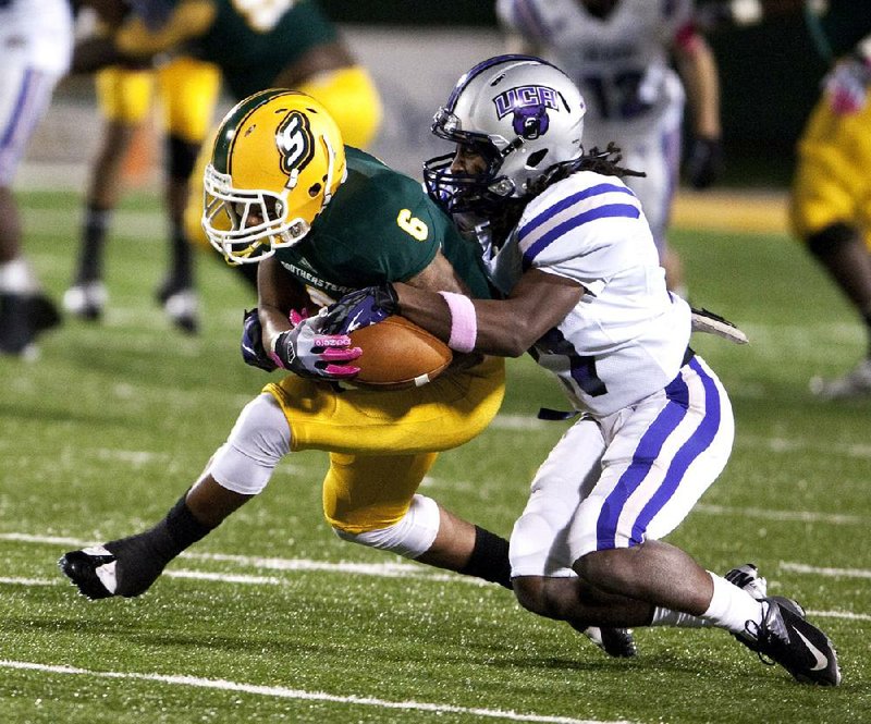 Central Arkansas defensive back Dillion Winfrey (right) strips the ball from Southeastern Louisiana wide receiver Tony McCrea, which resulted in an incomplete pass in the first half of the Bears’ 34-14 victory at Stawberry Stadium in Hammond, La. 