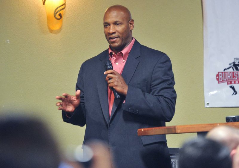 NWA Media/ MICHAEL WOODS --10/24/2012-- University of Arkansas defensive coordinator Paul Haynes speaks to fans and supporters during the Northwest Arkansas Touchdown Club lunch  Wednesday afternoon at Mermaids in Fayetteville.