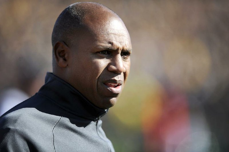 Kentucky head coach Joker Phillips stands on the sidelines during the first half of an NCAA college football game against Missouri Saturday, Oct. 27, 2012, in Columbia, Mo. (AP Photo/L.G. Patterson)