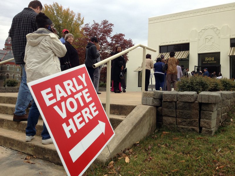 Voters line up Monday, Nov. 5, 2012, at the Pulaski County Regional Building in downtown Little Rock for early voting.