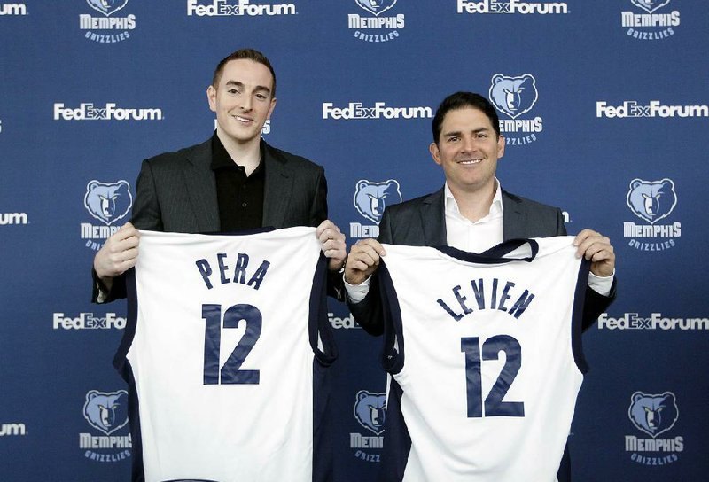 The Memphis Grizzlies introduced their new owner, Robert J. Pera (left), during a news conference Monday in Memphis. 