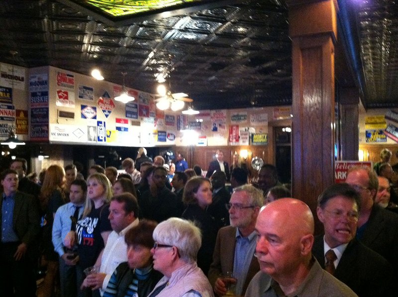 Arkansas Democrats await results Tuesday, Nov. 6, 2012, at a watch party at Cotham's in the City, Little Rock.