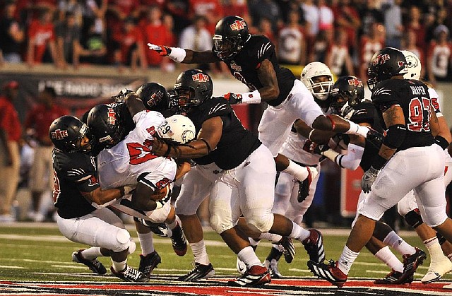 Arkansas State’s defense, shown stopping South Alabama’s Terrance Timmons on Oct. 13, has forced seven turnovers in victories against North Texas and Louisiana-Lafayette the past two weeks. 