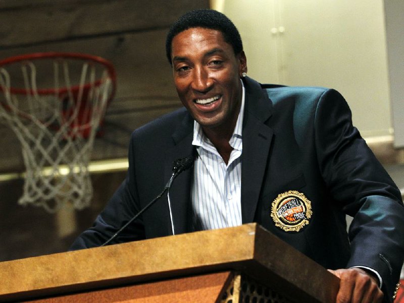 Basketball Hall of Fame inductee Scottie Pippen speaks during the enshrinement news conference at the Hall of Fame Museum in Springfield, Mass. Friday, Aug. 13, 2010. (AP Photo/Elise Amendola)