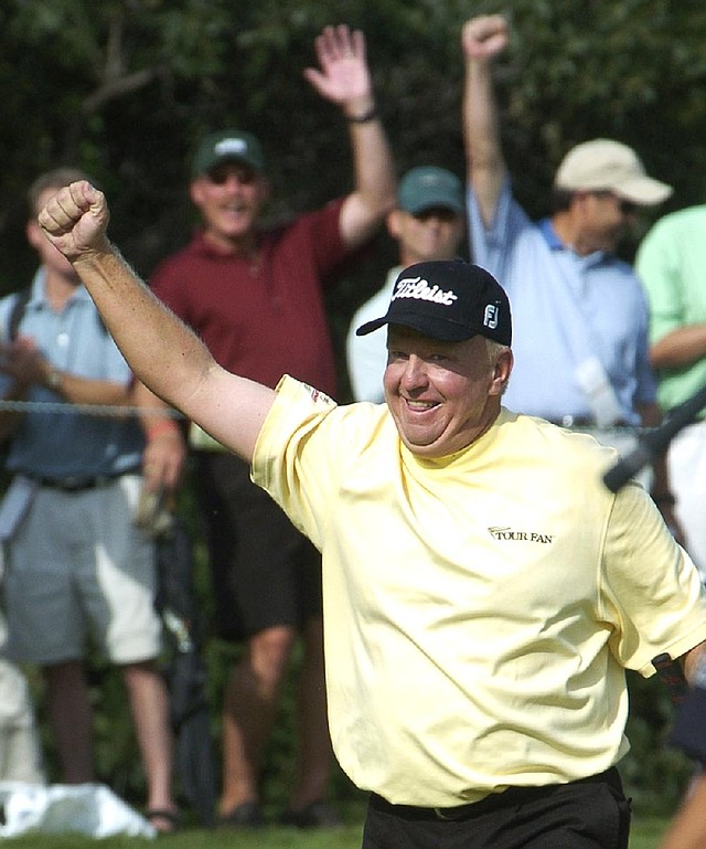 Billy Mayfair, of Scottsdale, Ariz., reacts after making an eagle on the par-five 17th hole during first round of the International Golf Tournament in Castle Rock, Colo., on Friday, August 5, 2005. (AP Photo/Rob Stuehrk)