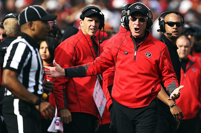 Texas Tech head coach Tommy Tuberville yells against Texas during their NCAA college football game, Saturday, Nov. 3, 2012, in Lubbock, Texas. (AP Photo/Lubbock Avalanche-Journal,Stephen Spillman)  LOCAL TV OUT