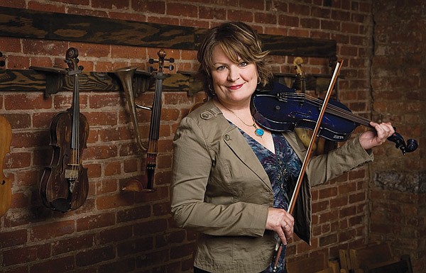 Eileen Ivers, an Irish fiddle player, is known for her work in “Riverdance” and also the group Cherish the Ladies. Ivers and her band, Immigrant Soul, perform Thursday at the Walton Arts Center in Fayetteville. 