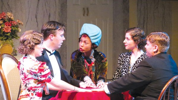 Mrs. Bradman (Emily Tomlinson), from left, Charles Condomine (Kieran Cronin), Ruth Condomine (Whitney Masters) and Dr. Bradman (Andrew Snyder ) are shocked by the revelations of clairvoyant Madame Arcati (Missy Maramara), center, in the University