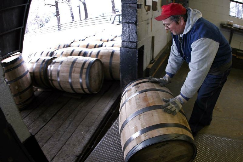 Jim Reid, a Beam Inc. employee, loads barrels of Jim Beam bourbon whiskey onto a truck headed for a rack house to be aged in Clermont, Ky. Beam is trying to develop a market for its whiskey in Russia, where the government is working to cut down alcohol consumption. 
