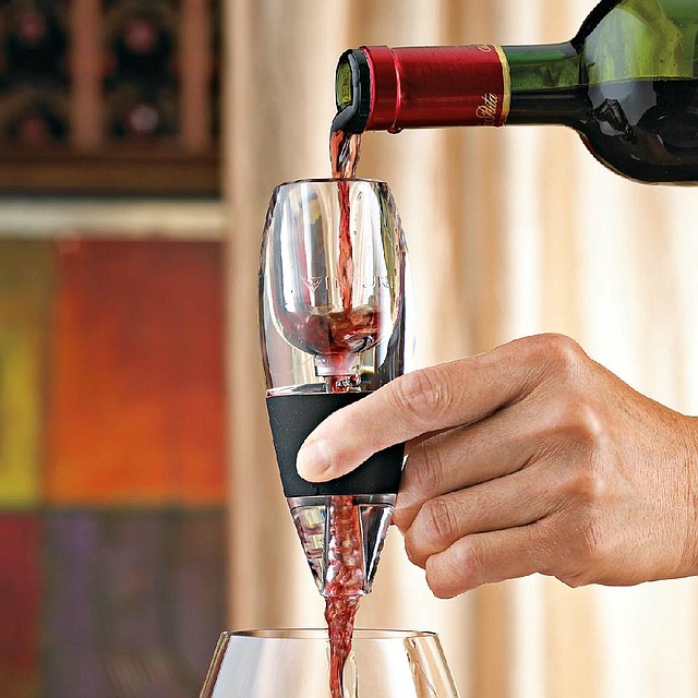 Aerators are growing in popularity as wine drinkers seek to cut down on the time spent letting their wine breathe. A Vinturi aerator like this one will aerate wine in the time it takes to pour a glass. 