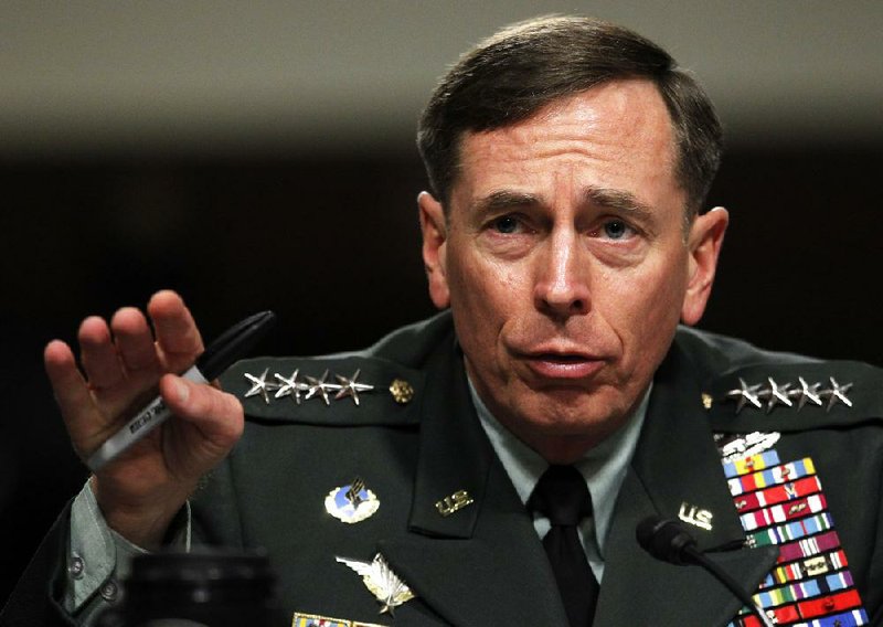 David Petraeus, shown testifying before a Senate panel in June, turned in his resignation as CIA head on Thursday.


