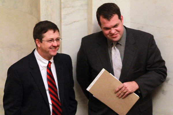 Sen. Larry Teague (left), DNashville, talks with new state Senate Pro Tempore Michael Lamoureux, R-Russellville, in the Senate chamber Thursday. Teague will be co-chairman of the joint Budget Committee. 