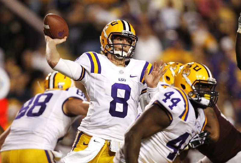 LSU quarterback Zach Mettenberger (8) completed 19 of 30 passes for 273 yards and 2 touchdowns to lead the seventh-ranked Tigers to a 37-17 victory over Mississippi State on Saturday in Baton Rouge. 