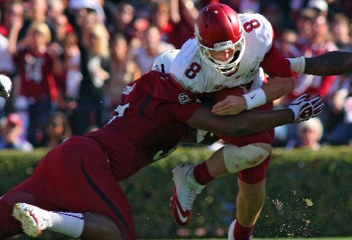 Arkansas Democrat-Gazette/STEPHEN B. THORNTON -- South Carolina's Aldrick Fordham sacks Arkansas QB Tyler Wilson in the second quarter during their game Saturday afternoon in South Carolina. 