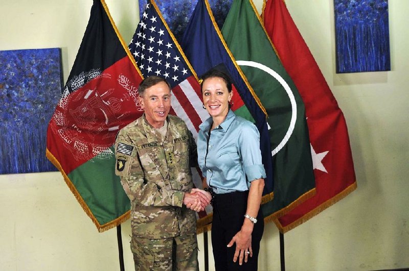 David Petraeus is seen with Paula Broadwell in this July 13, 2011, photo made available on the International Security Assistance Force’s Flickr website. 
