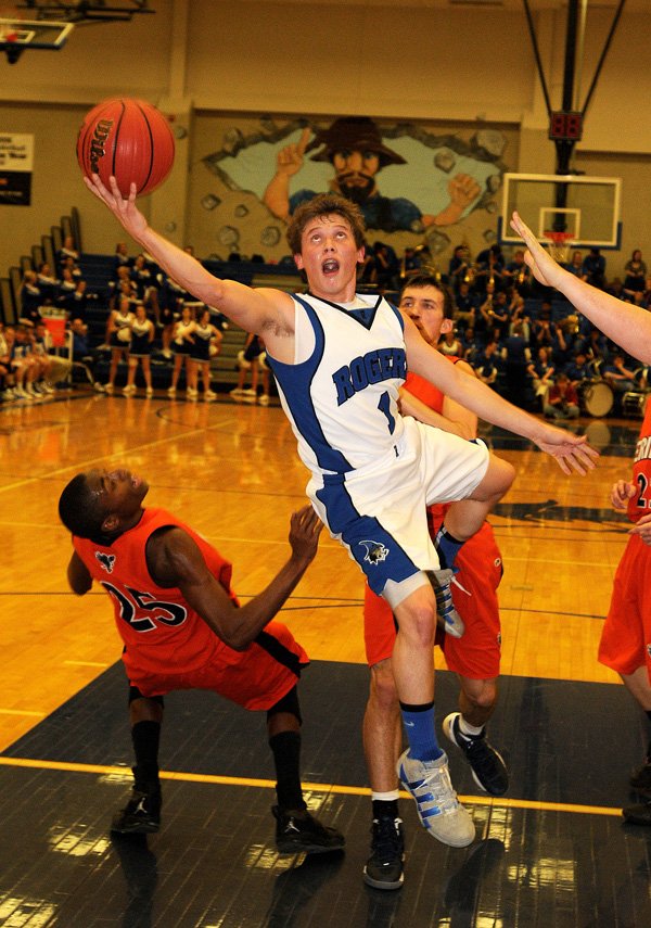 Keifer Holt, Rogers High, shoots Feb. 14 against Rogers Heritage in Kings Arena at Rogers High School. 