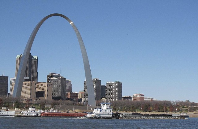Two northbound towboats pass St. Louis on the Mississippi River on Monday. Missouri Gov. Jay Nixon and barge-industry leaders have asked the federal government to help keep sufficient water flowing on the Missouri and Mississippi rivers. 