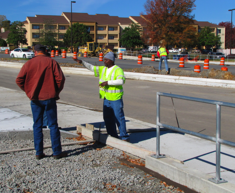 Crews work Tuesday off Financial Centre Parkway in west Little Rock. The Arkansas State Highway and Transportation Department warned motorists that construction on the new I-630/I-430 interchange would limit Financial Centre Parkway and Shackleford Road to a single lane in each direction at times this week.