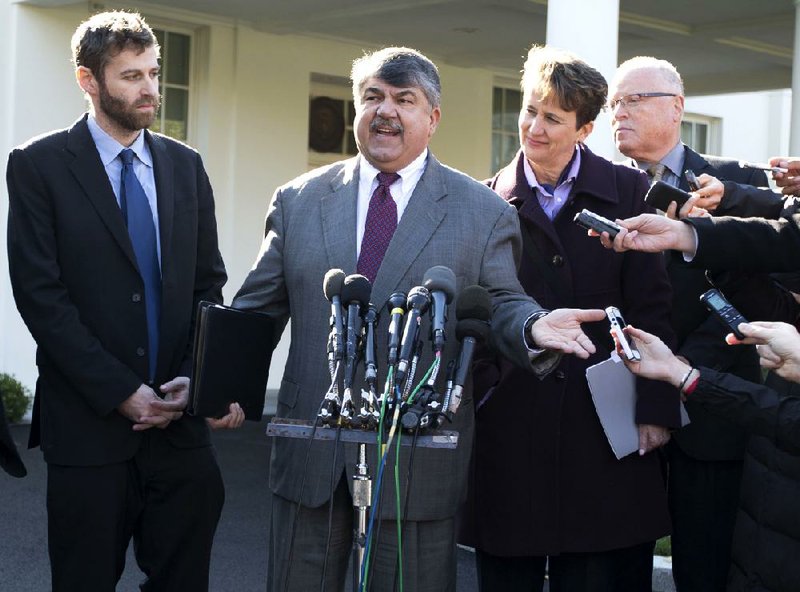 AFL-CIO President Richard Trumka speaks Tuesday outside the White House about labor leaders’ meeting with President Barack Obama. With Trumka are (left) Justin Ruben of MoveOn.org, Mary Kay Henry, head of the Service Employees International Union and Lee Saunders, president of the American Federation of State, County and Municipal Employees. 
