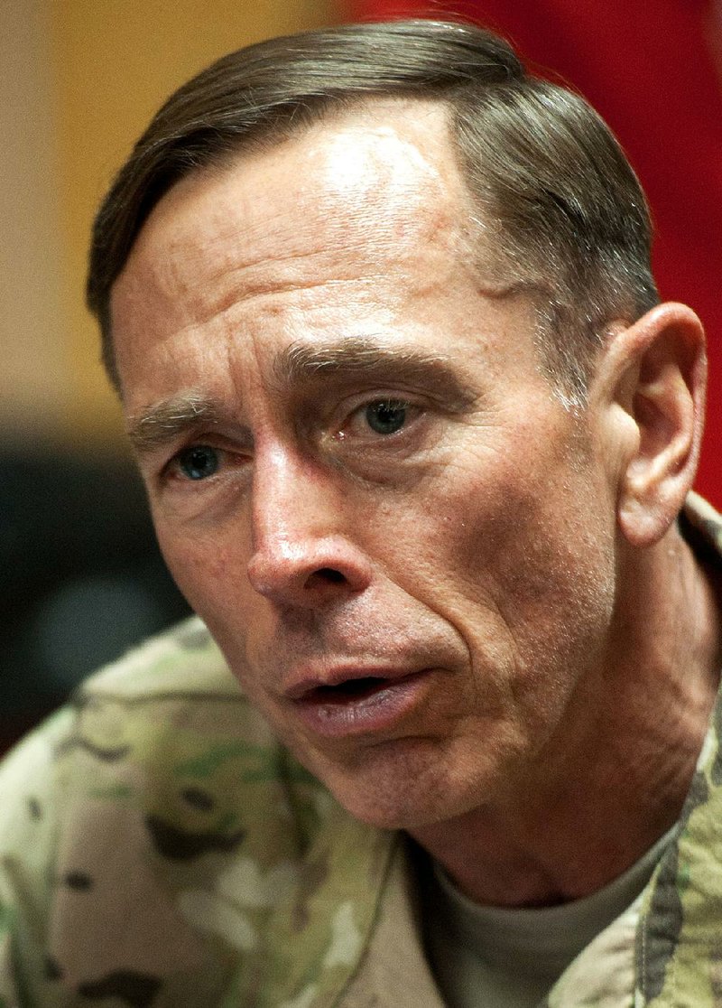 Army Gen. David Petraeus, the top U.S. commander in Afghanistan and soon-to-be Director of CIA, conducts a question and answer session with the media, traveling with the new U.S. Defense Secretary, Saturday, July 9, 2011, at Camp Eggers in Kabul, Afghanistan. (AP Photo/Paul J. Richards, Pool)