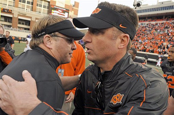 Oklahoma State's Mike Gundy (right) and TCU's Gary Patterson have both been rumored for the Razorbacks' head coaching vacancy. 