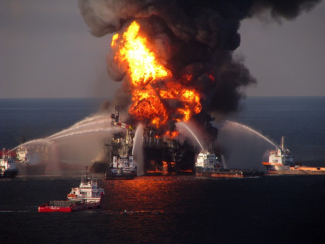 Fire boat response crews battle the blazing remnants of the off shore oil rig Deepwater Horizon in this April 21, 2010, file image provided by the U.S. Coast Guard, 
