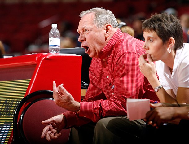 Tom Collen instructs his team from the sidelines of an exhibition win in Fayetteville. 