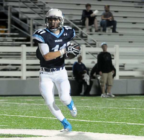 Gus Vitt, Springdale Har-Ber junior receiver, scores a touchdown Nov. 9 against Little Rock Central at Jarrell Williams Bulldog Stadium in Springdale. Vitt is the secondleading receiver for the Wildcats, who play tonight at Fort Smith Southside in a Class 7A state playoff game. 