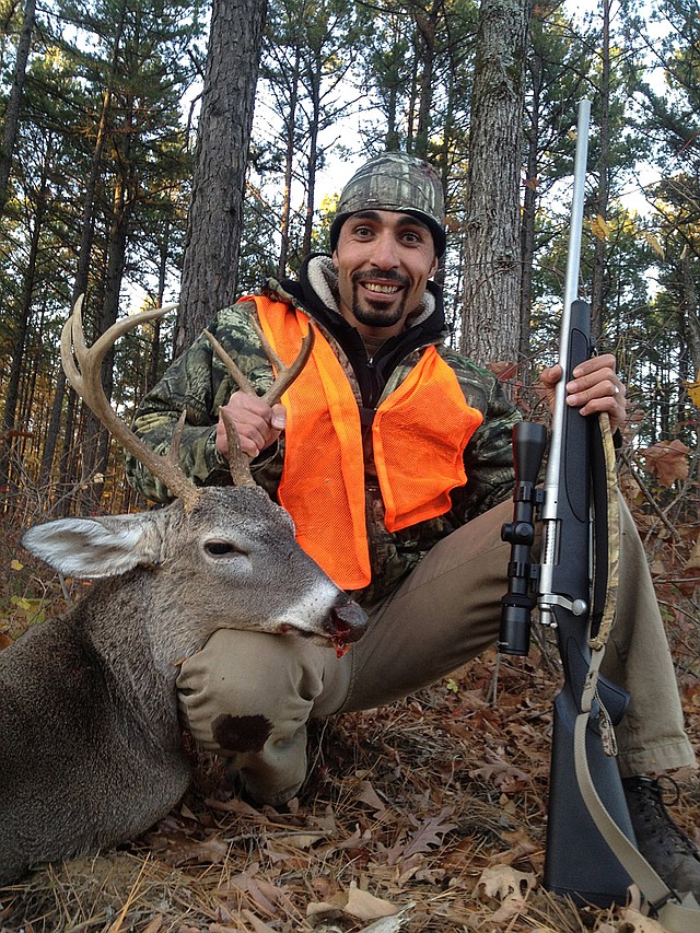 Basel Khalil of North Little Rock bagged this 8-point buck last week during his first deer hunt in the Ozark National Forest. 