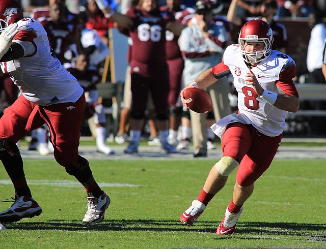 Arkansas senior quarterback Tyler Wilson (right) came into Saturday’s game with a more established reputation than Mississippi State counterpart Tyler Russell, but Russell had the edge Saturday in the Bulldogs’ 45-14 victory, throwing for more yards and touchdowns.