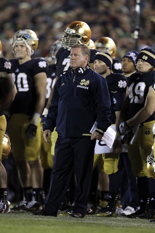 Notre Dame Coach Brian Kelly gave the Fighting Irish their only No. 1 vote in the coaches’ poll last week. He wasn’t the only one Sunday, as the Irish moved from No. 3 to No. 1 in the Bowl Championship Series rankings. 