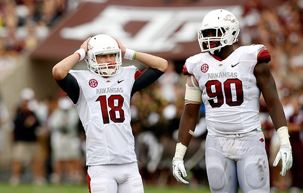 NWA Media/JASON IVESTER -- Arkansas kicker Zach Hocker (left) and defensive end Colton Miles-Nash look on after a missed field goal during the third quarter against Texas A&M on Saturday, Sept. 29, 2012, at Kyle Field in College Station, Texas.